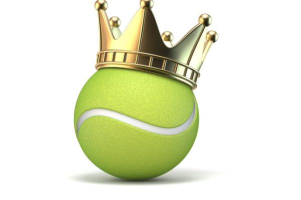 A green tennis ball with a gold king's crown balanced on top of it